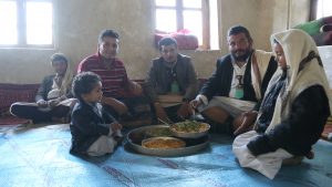 Fahd’s three brothers (centre) and two nephews having a meal at the Ghazy home in 2013