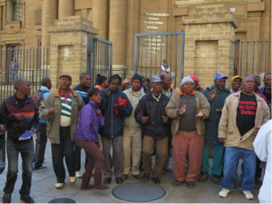 Vaal community members gather outside the High Court in Johannesburg