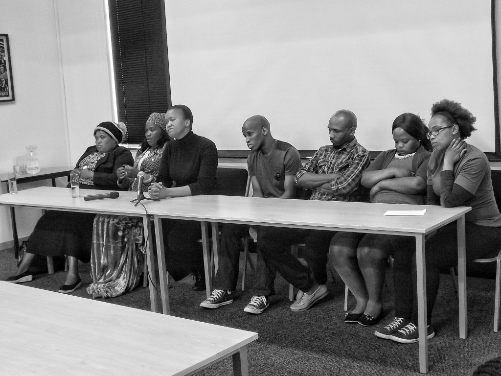 Widows and children of the deceased miners fielding questions from the media at the launch of “Imbokodo: The Widows of Marikana”. Credit: Zwonaka Netshifulani