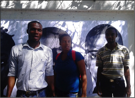 BAI Bertha Fellows Jhimmy Surin, Gladys Thermezi and Ronald Chataigne pose after installing photos at UN logbase
